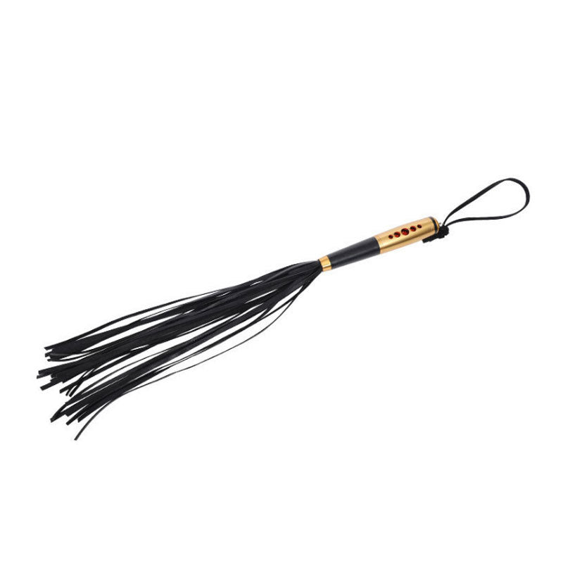 Golden Flogger With Red Gems